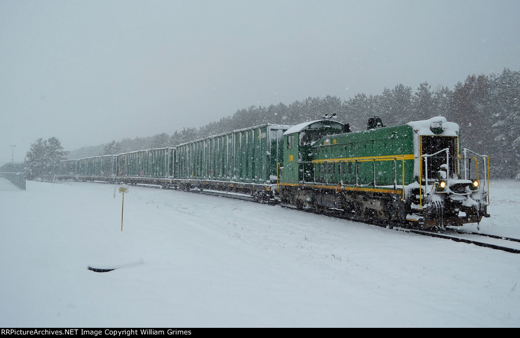 Waste Management working in the snow